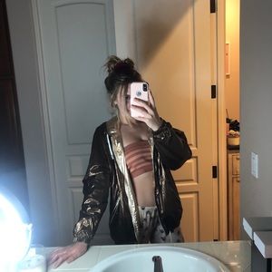 Reversible metallic rain jacket